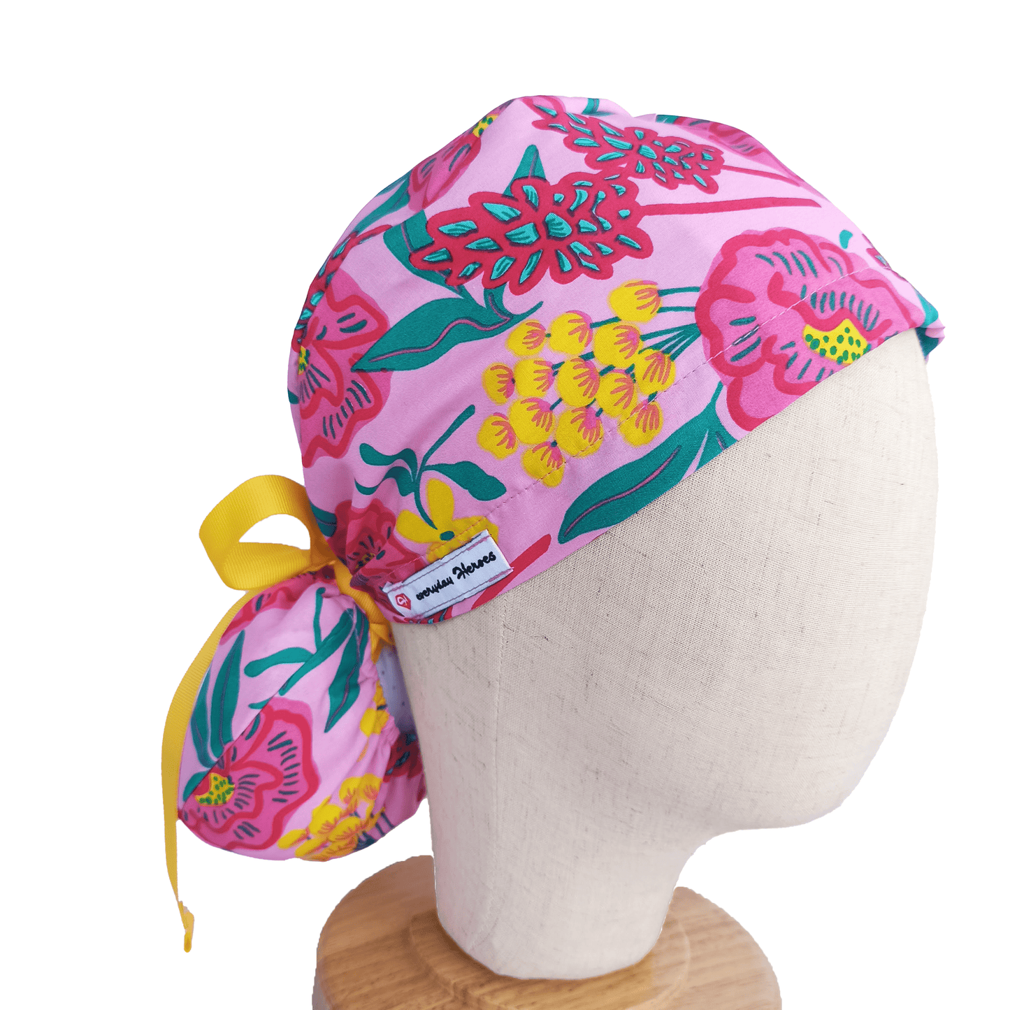Pink scrub cap with flowers andyellow ribbon