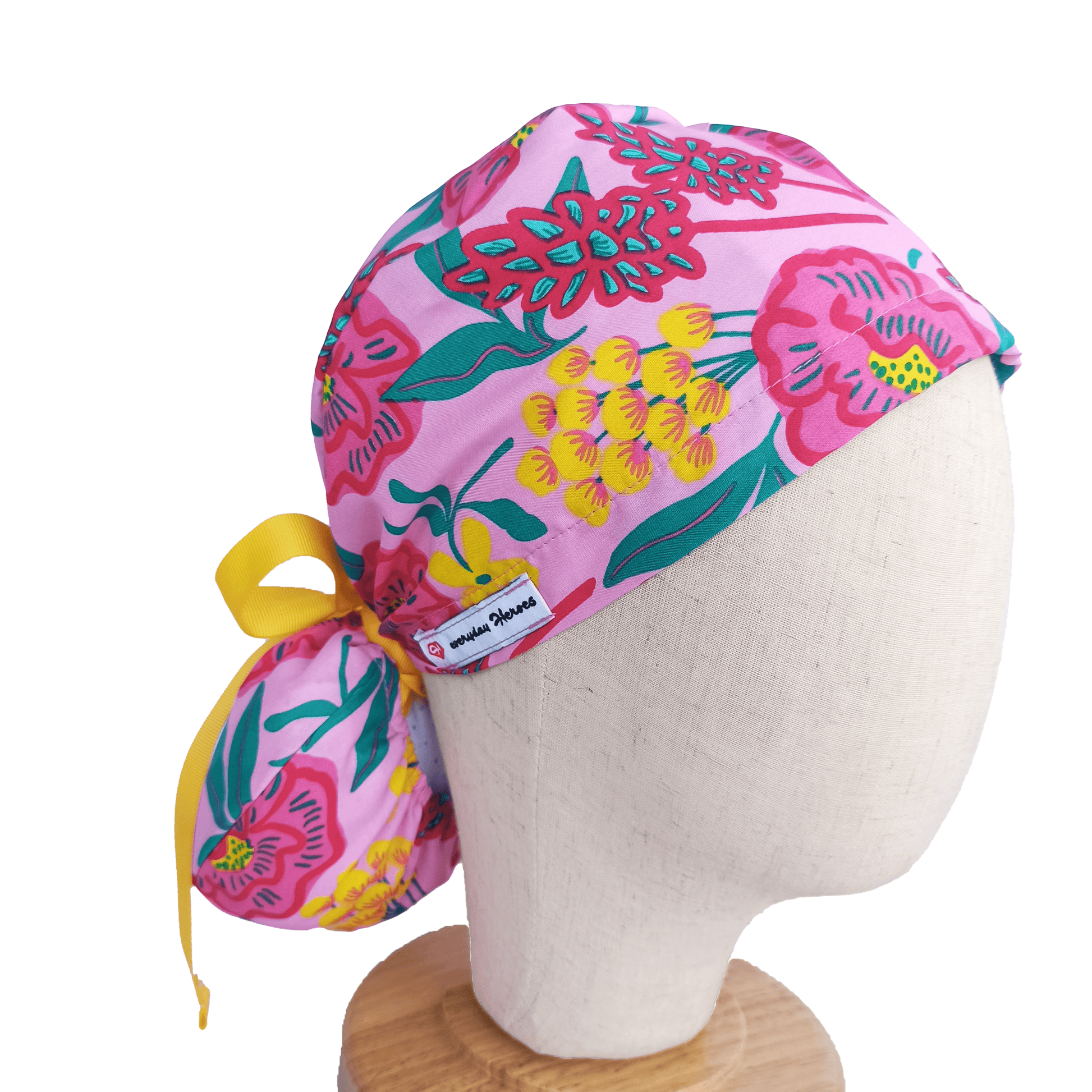 Pink scrub cap with flowers andyellow ribbon