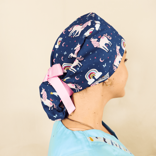 ponytail scrub cap with unicorns theme and rainbows on it , blue pink ribbons and satin lined inside or your name with embroidery customization service from our shop