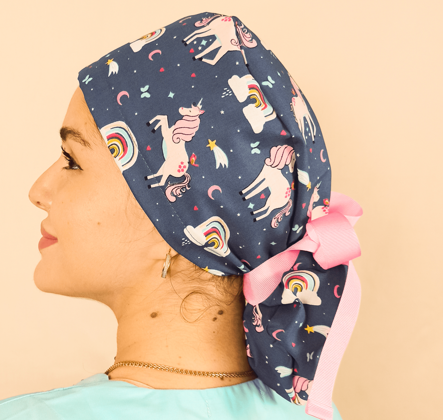 ponytail scrub cap with unicorns theme and rainbows on it , blue pink ribbons and satin lined inside or your name with embroidery customization service from our shop