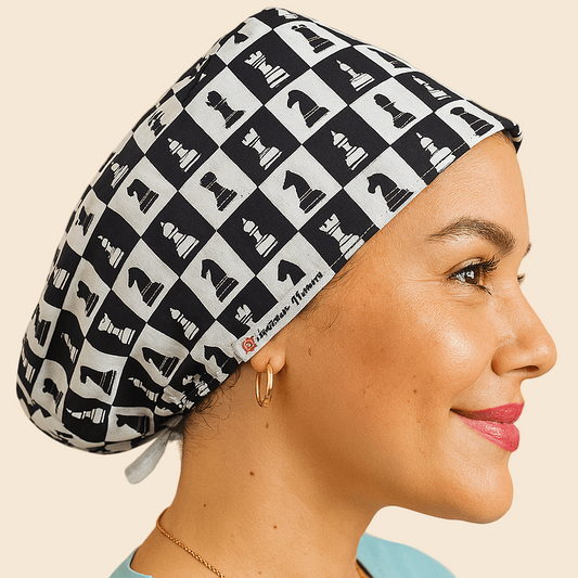 A woman wearing a black and white patterned cap with a chessboard design.