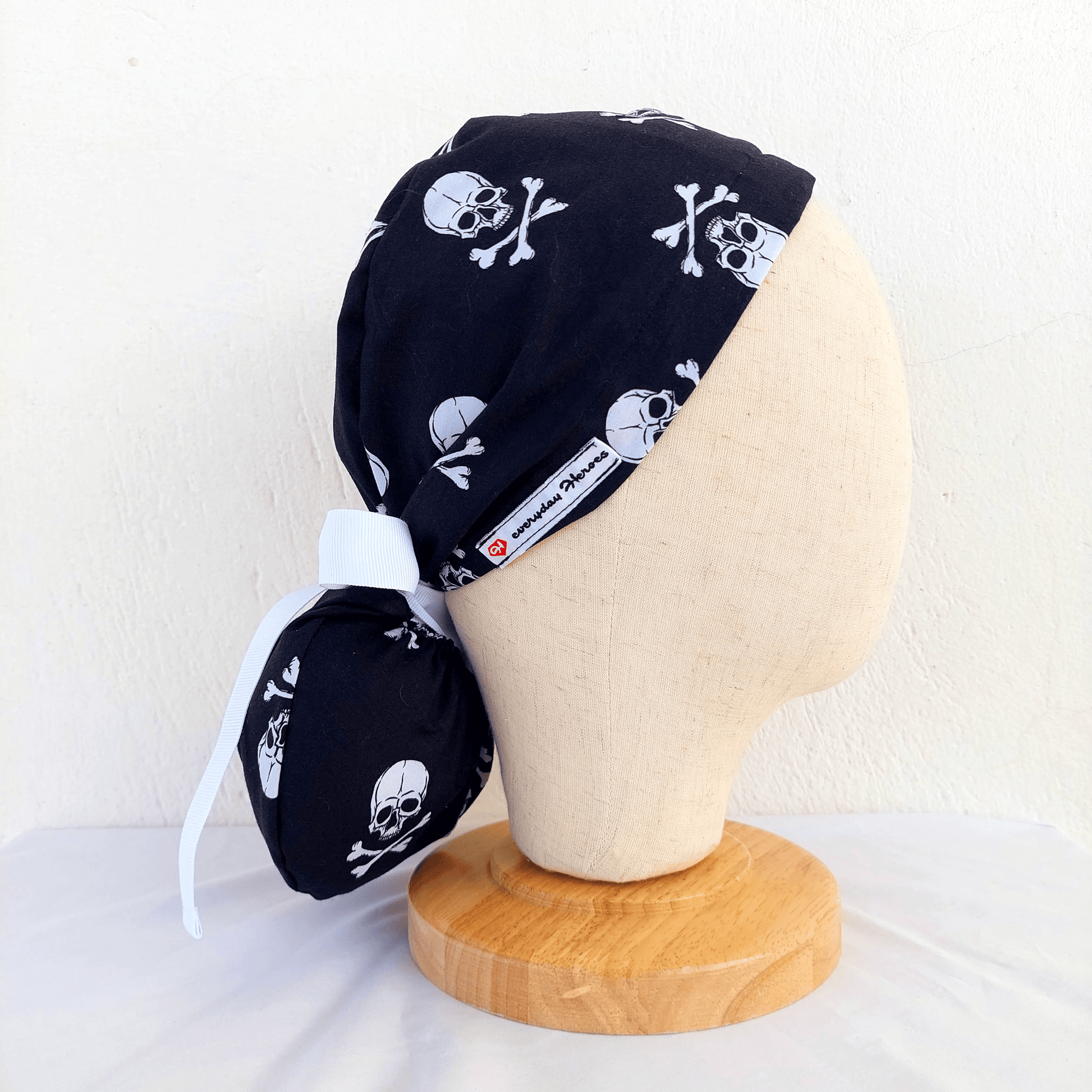 White Skull on a black  Scrub Cap Ponytail 