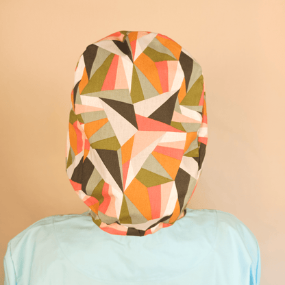 Retro geometric scrub cap for women featuring colorful Euro style design with satin lining option. Custom surgical cap ideal for nurses, doctors, estheticians, or anatomy students. Comfortable and stylish medical scrub hat perfect for esthetician business use, healthcare professionals, or anyone seeking a unique surgical cap with modern geometric print.