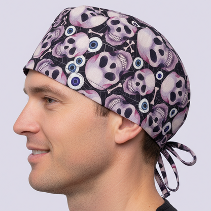 Male Doctor Wearing White Skulls on Black Scrub Cap