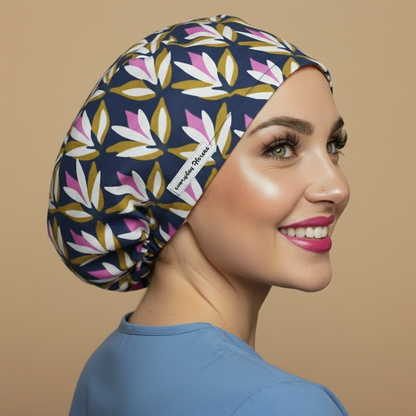 Navy blue geometric scrub cap back side - body turned showing more back - signature model - no hands - pink white gold petals pattern - 3000x3000px